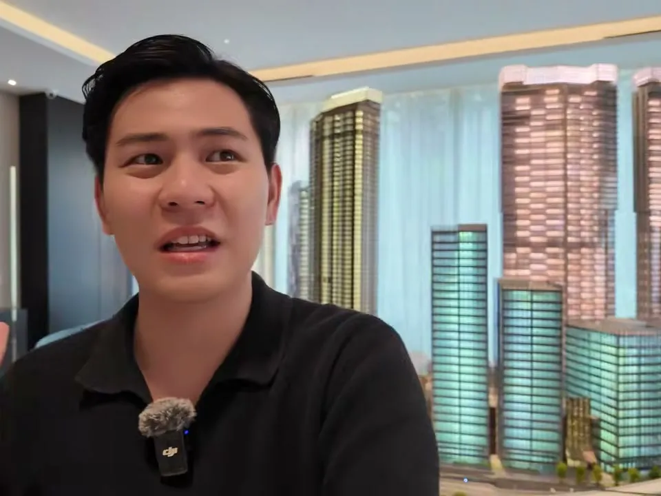 Dylan Ngan at the Pavilion Damansara Heights sales gallery, in front of the scale model